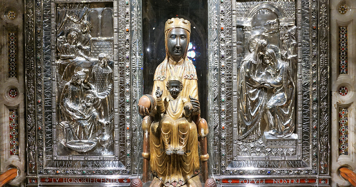 La Moreneta "black madonna" statue at the altar of Montserrat Basilica. 