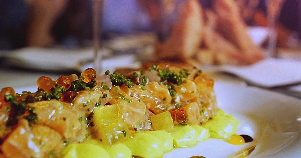 Barcelona foodies tasting delicous tapas.