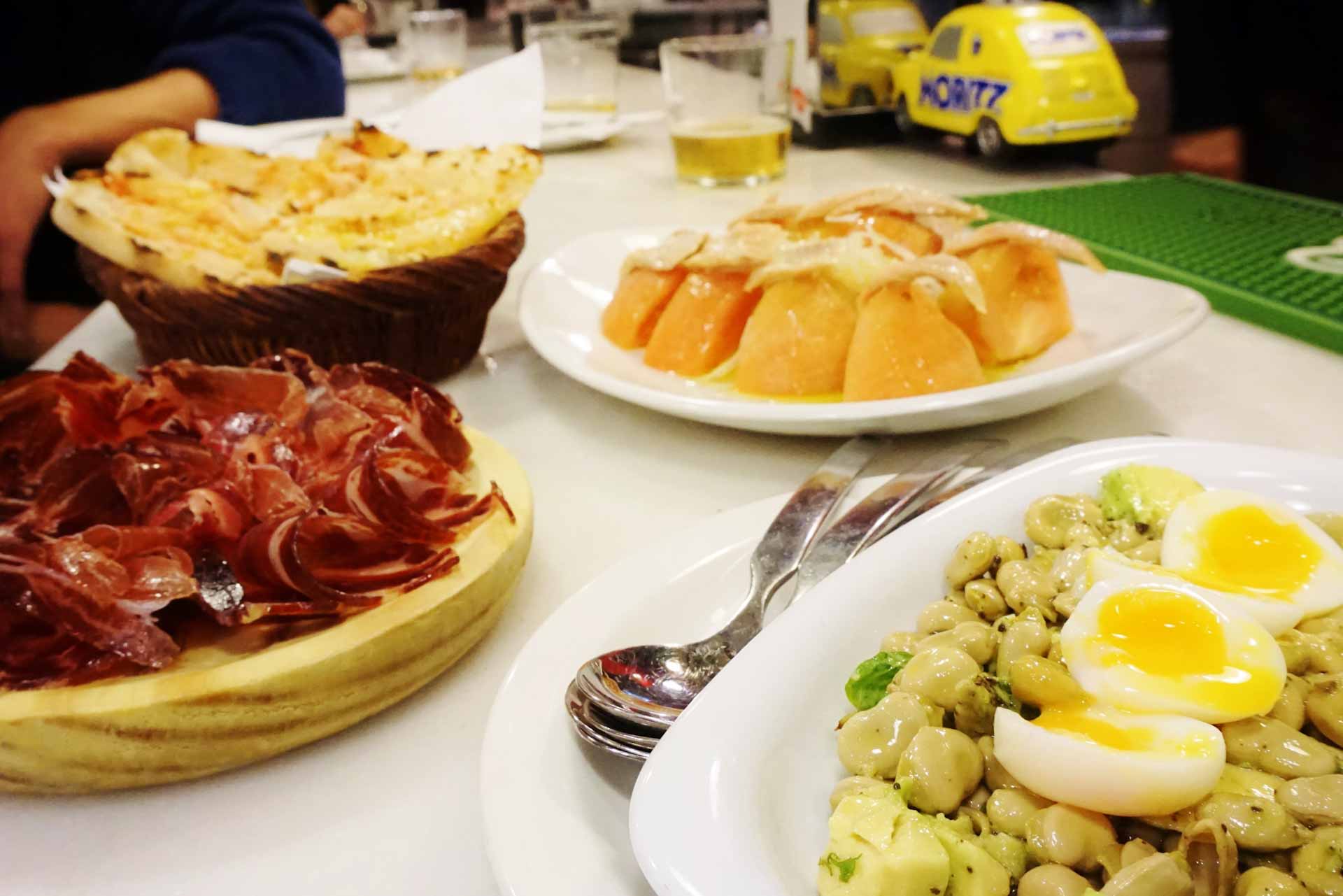Assortment of authentic spanish tapas during Barcelona food tour. 