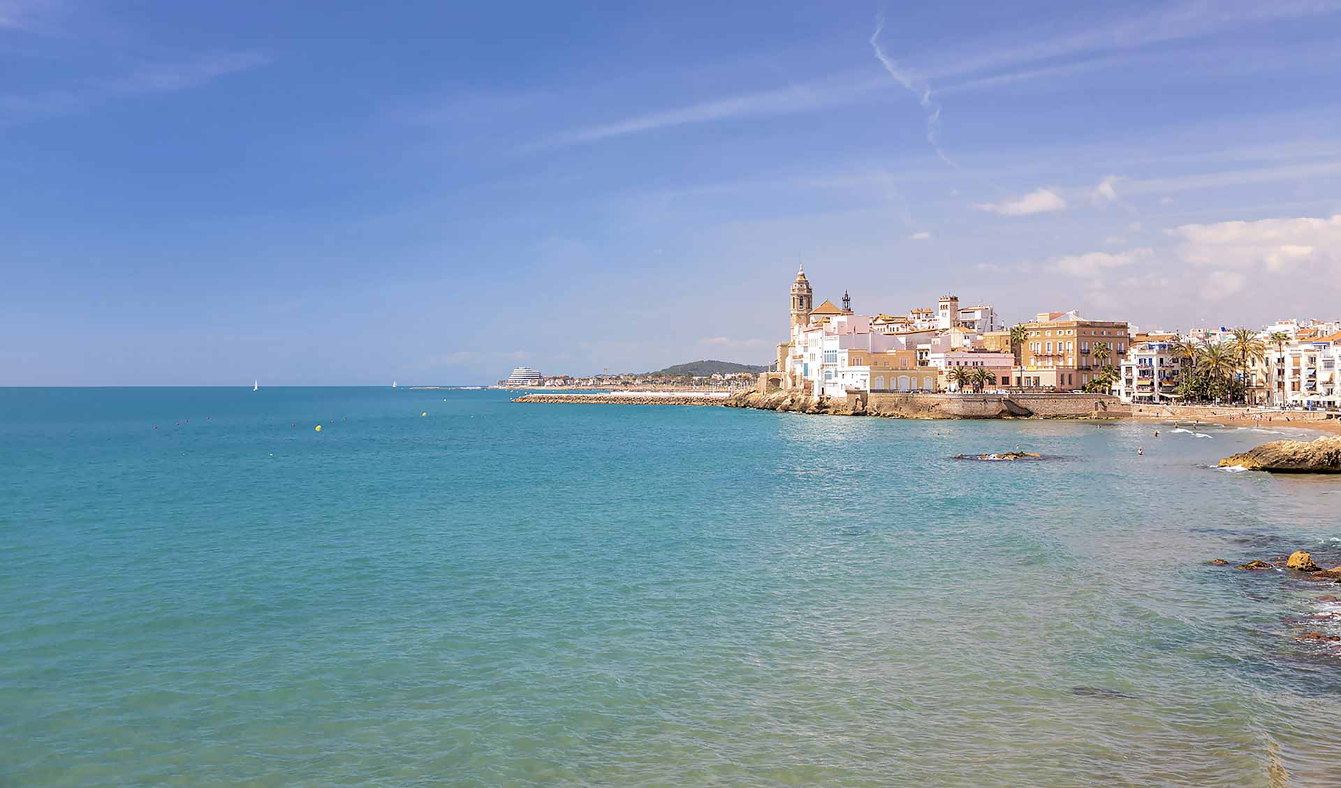 Beach and city centre of coastal town of Sitges.